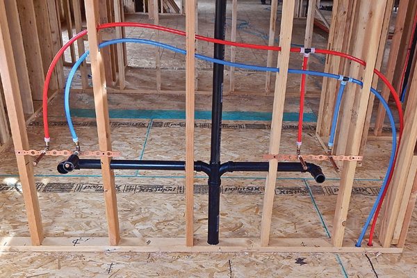 Plumbing blueprint plans, symbolizing careful planning